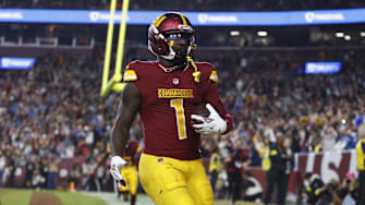  Washington Commanders wide receiver Deebo Samuel Sr. (1) reacts after scoring a touchdown during the third quarter against the Detroit Lions at Northwest Stadium. Mandatory Credit: Peter Casey-Imagn Images