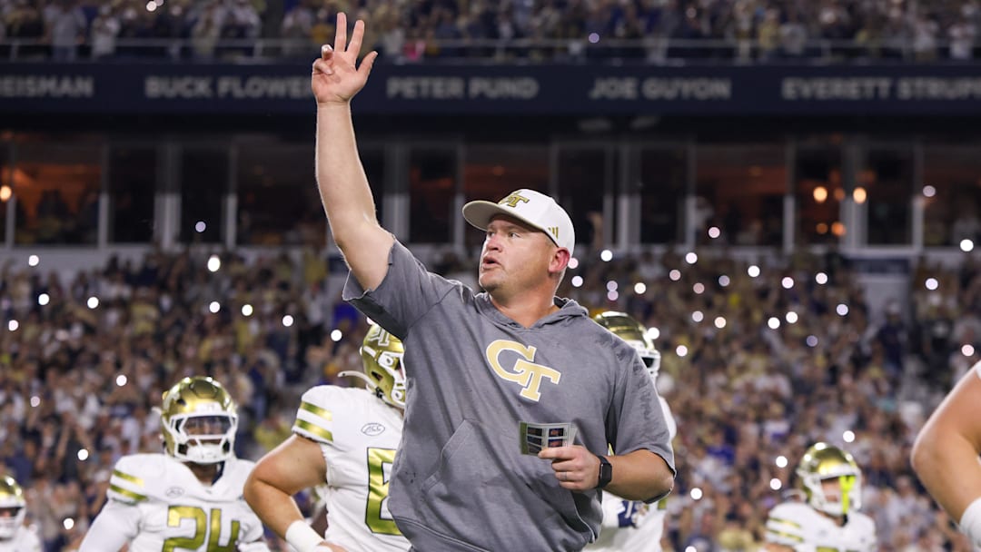 Nov 22, 2025; Atlanta, Georgia, USA; Georgia Tech Yellow Jackets head coach Brent Key runs on the field before a game against the Pittsburgh Panthers at Bobby Dodd Stadium at Hyundai Field. Mandatory Credit: Brett Davis-Imagn Images