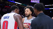 Mar 19, 2025; Miami, Florida, USA; Detroit Pistons guard Cade Cunningham (2) celebrates with center Jalen Duren (0) after the game against the Miami Heat at Kaseya Center. Mandatory Credit: Sam Navarro-Imagn Images