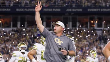 Nov 22, 2025; Atlanta, Georgia, USA; Georgia Tech Yellow Jackets head coach Brent Key runs on the field before a game against the Pittsburgh Panthers at Bobby Dodd Stadium at Hyundai Field. Mandatory Credit: Brett Davis-Imagn Images