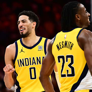 May 13, 2025; Cleveland, Ohio, USA; Indiana Pacers forward Aaron Nesmith (23) and guard Tyrese Haliburton (0) celebrate during the second half of game five against the Cleveland Cavaliers in the second round for the 2025 NBA Playoffs at Rocket Arena. Mandatory Credit: Ken Blaze-Imagn Images