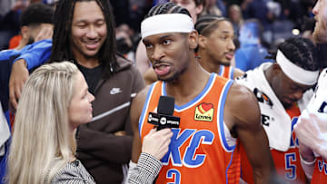 Dec 10, 2024; Oklahoma City, Oklahoma, USA; Oklahoma City Thunder guard Shai Gilgeous-Alexander (2) speaks to a tv reporter after his team defeated the Dallas Mavericks at Paycom Center. Mandatory Credit: Alonzo Adams-Imagn Images