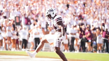 Mississippi State running back Fluff Bothwell (24) celebrates a touchdown during a college football game between Tennessee and Mississippi State at Davis Wade Stadium in Starkville, Miss., on Sept. 27, 2025.