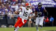Sep 14, 2025; Baltimore, Maryland, USA; Cleveland Browns quarterback Joe Flacco (15) runs the ball against Baltimore Ravens linebacker Odafe Oweh (99) during the third quarter at M&T Bank Stadium. Mandatory Credit: Peter Casey-Imagn Images