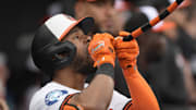 May 4, 2025; Baltimore, Maryland, USA; Baltimore Orioles center fielder Cedric Mullins (31) drinks from the home run fountain after hitting a home run against the Kansas City Royals during the fifth inning at Oriole Park at Camden Yards. Mandatory Credit: Gregory Fisher-Imagn Images