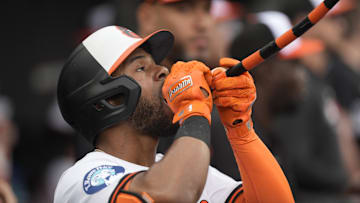 May 4, 2025; Baltimore, Maryland, USA; Baltimore Orioles center fielder Cedric Mullins (31) drinks from the home run fountain after hitting a home run against the Kansas City Royals during the fifth inning at Oriole Park at Camden Yards. Mandatory Credit: Gregory Fisher-Imagn Images