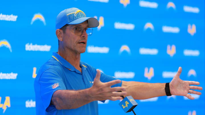 Jul 24, 2024; El Segundo, CA, USA;  Los Angeles Chargers head coach Jim Harbaugh speaks to the media after the first day of training camp at The Bolt. Mandatory Credit: Kiyoshi Mio-USA TODAY Sports