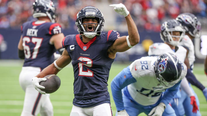 Dec 31, 2023; Houston, Texas, USA; Houston Texans wide receiver Robert Woods (2) celebrates his first down run against the Tennessee Titans in the first quarter at NRG Stadium. Mandatory Credit: Thomas Shea-USA TODAY Sports