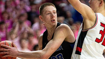 Waukee Northwest's Landon Davis (30) looks to pass to a teammate during the Class 4A semifinal against Cedar Falls on Wednesday, March 12, 2025, at Wells Fargo Arena.