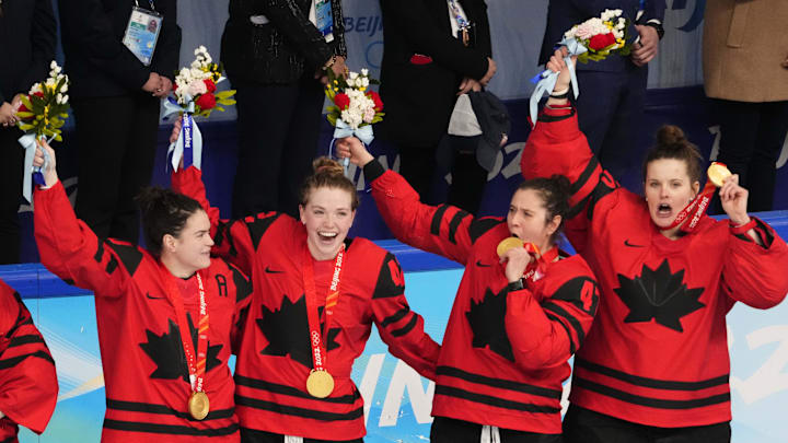 Feb 17, 2022; Beijing, China; Team Canada players celebrate during the medals ceremony during the Beijing 2022 Olympic Winter Games at Wukesong Sports Centre. Mandatory Credit: Rob Schumacher-Imagn Images