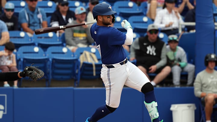 Feb 22, 2025; Dunedin, Florida, USA; Toronto Blue Jays shortstop Bo Bichette (11) reaches base on error against the New York Yankees during the third inning at TD Ballpark. Feb 22, 2025; Dunedin, Florida, USA; Toronto Blue Jays shortstop Bo Bichette (11) reaches base on error against the New York Yankees during the third inning at TD Ballpark.