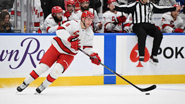 Feb 22, 2025; Toronto, Ontario, CAN;  Carolina Hurricanes forward Mikko Rantanen (96) skates with the puck against the Toronto Maple Leafs in the third period at Scotiabank Arena. Mandatory Credit: Dan Hamilton-Imagn Images