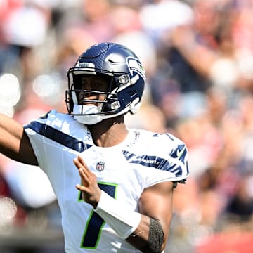 Sep 15, 2024; Foxborough, Massachusetts, USA; Seattle Seahawks quarterback Geno Smith (7) throws against the New England Patriots during the first half at Gillette Stadium. Mandatory Credit: Brian Fluharty-Imagn Images