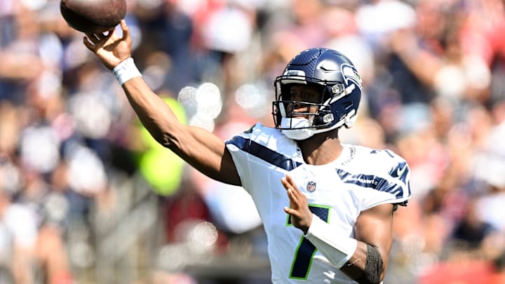 Sep 15, 2024; Foxborough, Massachusetts, USA; Seattle Seahawks quarterback Geno Smith (7) throws against the New England Patriots during the first half at Gillette Stadium. Mandatory Credit: Brian Fluharty-Imagn Images