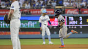 Jose Altuve rounds the bases after mashing a three-run home run in the sixth inning of the Astros' 18-1 win over the Dodgers.