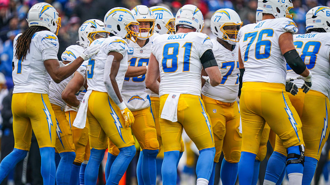 Los Angeles Chargers quarterback Justin Herbert in the huddle against the New England Patriots.