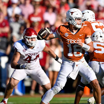 Oct 11, 2025; Dallas, Texas, USA; Texas Longhorns quarterback Arch Manning (16) looks to throw the ball during the game between the Texas Longhorns and the Oklahoma Sooners at the Cotton Bowl. Mandatory Credit: Jerome Miron-Imagn Images