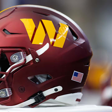 Sep 29, 2024; Glendale, Arizona, USA; Detailed view of a Washington Commanders helmet at State Farm Stadium. Mandatory Credit: Mark J. Rebilas-Imagn Images
