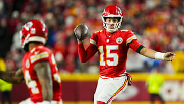 Dec 8, 2024; Kansas City, Missouri, USA; Kansas City Chiefs quarterback Patrick Mahomes (15) rolls out to pass during the second half against the Los Angeles Chargers at GEHA Field at Arrowhead Stadium. Mandatory Credit: Jay Biggerstaff-Imagn Images