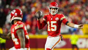 Dec 8, 2024; Kansas City, Missouri, USA; Kansas City Chiefs quarterback Patrick Mahomes (15) rolls out to pass during the second half against the Los Angeles Chargers at GEHA Field at Arrowhead Stadium. Mandatory Credit: Jay Biggerstaff-Imagn Images