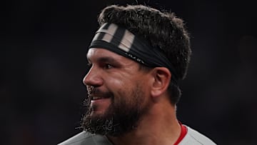 Aug 9, 2025; Arlington, Texas, USA; Philadelphia Phillies outfielder Kyle Schwarber (12) looks on during a pitching change in the eighth inning in a game against the Texas Rangers at Globe Life Field.