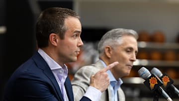 Jun 10, 2025; Scottsdale, AZ, USA; Phoenix Suns head coach Jordan Ott reacts as he speaks alongside general manager Brian Gregory during an introductory press conference at the Verizon 5g Performance Center. Mandatory Credit: Mark J. Rebilas-Imagn Images