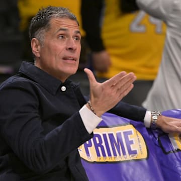 Nov 21, 2024; Los Angeles, California, USA;  Los Angeles Lakers general manager Rob Pelinka looks on as players warm up prior to the game against the Orlando Magic at Crypto.com Arena. Mandatory Credit: Jayne Kamin-Oncea-Imagn Images