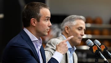 Jun 10, 2025; Scottsdale, AZ, USA; Phoenix Suns head coach Jordan Ott reacts as he speaks alongside general manager Brian Gregory during an introductory press conference at the Verizon 5g Performance Center. Mandatory Credit: Mark J. Rebilas-Imagn Images