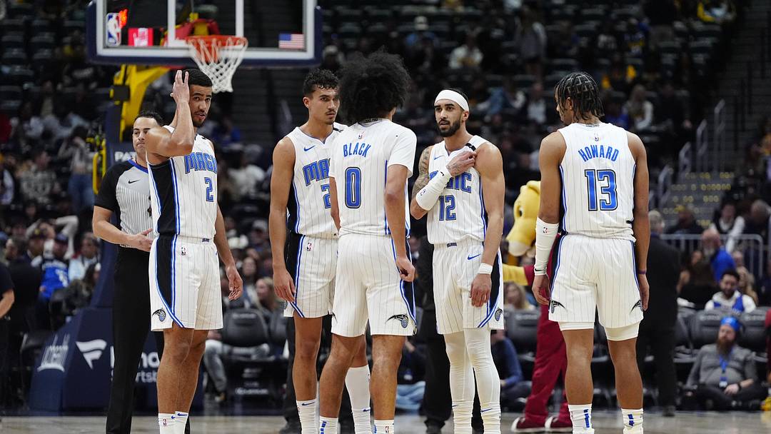 Feb 6, 2025; Denver, Colorado, USA; Orlando Magic guard Caleb Houstan (2), forward Tristan da Silva (23), guard Anthony Black (0), guard Trevelin Queen (12) and guard Jett Howard (13) huddle in the fourth quarter against the Denver Nuggets at Ball Arena. Mandatory Credit: Ron Chenoy-Imagn Images