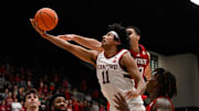 Feb 8, 2025; Stanford, California, USA; Stanford Cardinal guard Ryan Agarwal (11) shoots against NC State Wolfpack forward Ismael Diouf (33) in the second half at Maples Pavilion. Mandatory Credit: Eakin Howard-Imagn Images