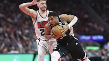 Feb 25, 2025; Houston, Texas, USA; Milwaukee Bucks forward Giannis Antetokounmpo (34) drives with the ball as Houston Rockets center Alperen Sengun (28) defends during the fourth quarter at Toyota Center. Mandatory Credit: Troy Taormina-Imagn Images