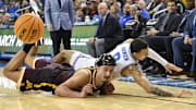 Feb 18, 2025; Los Angeles, California, USA; Minnesota Golden Gophers forward Dawson Garcia (3) and UCLA Bruins guard Kobe Johnson (0) collide while chasing a loose ball during the second half at Pauley Pavilion presented by Wescom. Mandatory Credit: Robert Hanashiro-Imagn Images