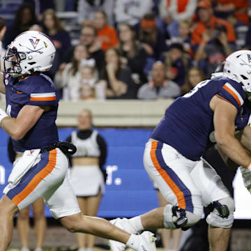Nov 8, 2025; Charlottesville, Virginia, USA; Virginia Cavaliers quarterback Chandler Morris (4) throws the ball against the Wake Forest Demon Deacons during the first half at Scott Stadium. Mandatory Credit: Amber Searls-Imagn Images