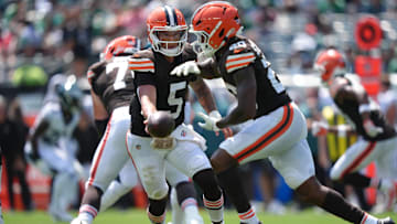 Aug 16, 2025; Philadelphia, Pennsylvania, USA; Cleveland Browns quarterback Dillon Gabriel (5) hands the ball to running back Pierre Strong Jr (20) against the Philadelphia Eagles in the first half at Lincoln Financial Field. Mandatory Credit: Kyle Ross-Imagn Images