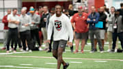 Mar 19, 2025; Tuscaloosa AL, USA; Quarterback Jalen Milroe calls a play as he throws for scouts at the University of Alabama Pro Day as several Crimson Tide players worked out for NFL teams in the Hank Crisp Indoor Practice Facility.
