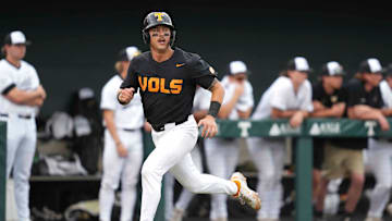 Tennessee outfielder Hunter Ensley (9) looks back towards the field while running to home plate during a NCAA baseball game between the Tennessee Volunteers and Vanderbilt Commodores at Lindsey Nelson Stadium on May 11, 2025.