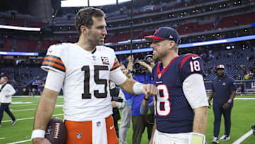 Dec 24, 2023; Houston, Texas, USA; Cleveland Browns quarterback Joe Flacco (15) talks with Houston Texans quarterback Case Keenum (18) after the game at NRG Stadium. Mandatory Credit: Troy Taormina-Imagn Images