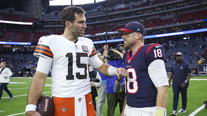 Dec 24, 2023; Houston, Texas, USA; Cleveland Browns quarterback Joe Flacco (15) talks with Houston Texans quarterback Case Keenum (18) after the game at NRG Stadium. Mandatory Credit: Troy Taormina-Imagn Images