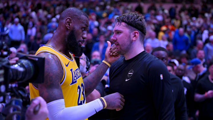 Dec 12, 2023; Dallas, Texas, USA; Los Angeles Lakers forward LeBron James (23) talks with Dallas Mavericks guard Luka Doncic (77) after the Mavericks defeat the Lakes at the American Airlines Center. Mandatory Credit: Jerome Miron-USA TODAY Sports