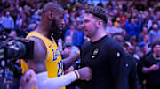 LeBron James talks with Luka Doncic at American Airlines Center back in 2023.