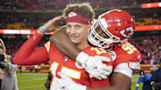Nov 6, 2022; Kansas City, Missouri, USA; Kansas City Chiefs defensive tackle Chris Jones (95) celebrates with quarterback Patrick Mahomes (15) after the win over the Tennessee Titans at GEHA Field at Arrowhead Stadium. Mandatory Credit: Denny Medley-Imagn Images
