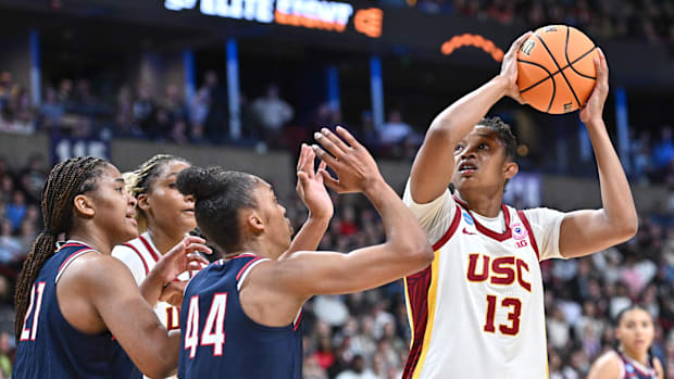 Mar 31, 2025; Spokane, WA, USA; USC Trojans center Rayah Marshall (13) shoots against UConn Huskies forward Aubrey Griffin (4