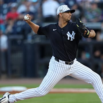 Mar 14, 2025; Tampa, Florida, USA; New York Yankees pitcher Carlos Carrasco (59) throws a pitch against the Philadelphia Phillies in the first inning during spring training at George M. Steinbrenner Field. Mandatory Credit: Nathan Ray Seebeck-Imagn Images