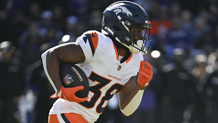 Nov 3, 2024; Baltimore, Maryland, USA; Denver Broncos running back Jaleel McLaughlin (38) rushes during the first half against the Baltimore Ravens at M&T Bank Stadium. Nov 3, 2024; Baltimore, Maryland, USA; Denver Broncos running back Jaleel McLaughlin (38) rushes during the first half against the Baltimore Ravens at M&T Bank Stadium.