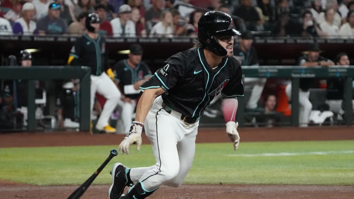 Aug 12, 2024; Phoenix, Arizona, USA; Arizona Diamondbacks outfielder Corbin Carroll (7) hits a against the Colorado Rockies in the first inning at Chase Field. Mandatory Credit: Rick Scuteri-USA TODAY Sports