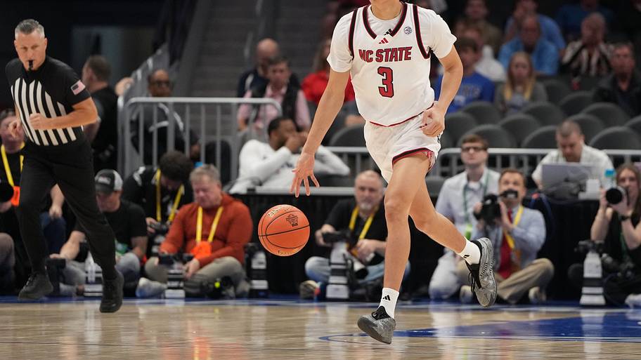 NC State guard Matt Able brings the ball up the court.