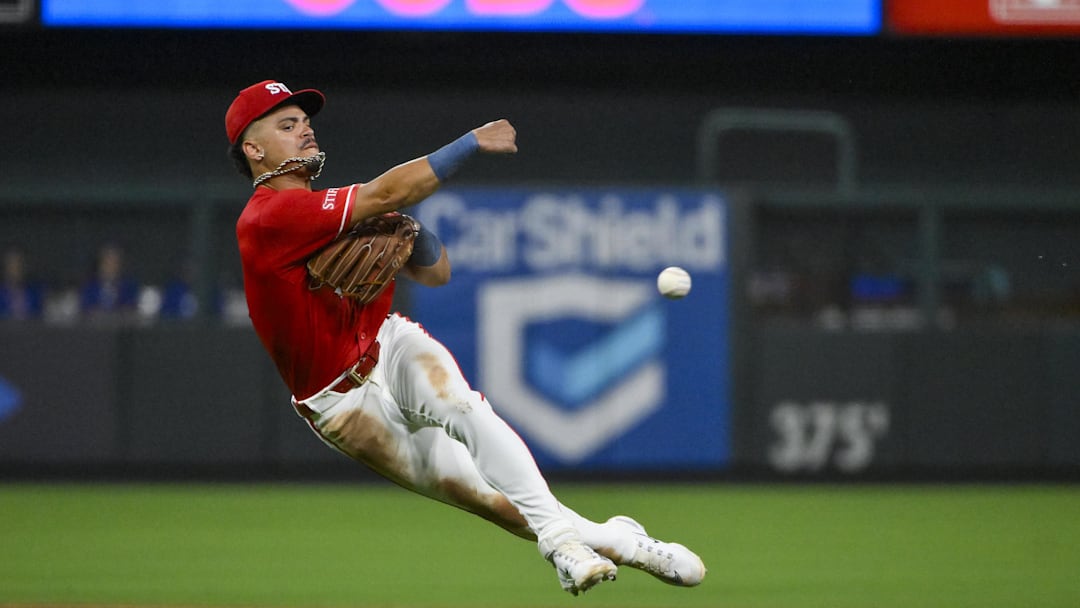 Aug 8, 2025; St. Louis, Missouri, USA; St. Louis Cardinals shortstop Masyn Winn (0) throws on the run but is able to throw out Chicago Cubs left fielder Ian Happ (not pictured) during the sixth inning at Busch Stadium. Mandatory Credit: Jeff Curry-Imagn Images Aug 8, 2025; St. Louis, Missouri, USA; St. Louis Cardinals shortstop Masyn Winn (0) throws on the run but is able to throw out Chicago Cubs left fielder Ian Happ (not pictured) during the sixth inning at Busch Stadium. Mandatory Credit: Jeff Curry-Imagn Images