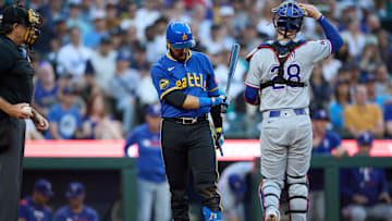 Aug 1, 2025; Seattle, Washington, USA; Seattle Mariners third baseman Eugenio Suarez (28) reacts after a strike out against the Texas Rangers during the third inning at T-Mobile Park. Mandatory Credit: John Froschauer-Imagn Images