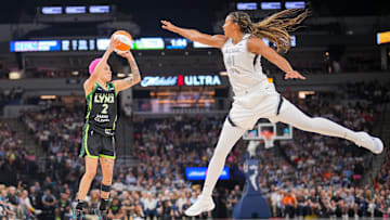 Jul 25, 2025; Minneapolis, Minnesota, USA; Minnesota Lynx guard Natisha Hiedeman (2) shoots against the Las Vegas Aces center Kiah Stokes (41) in the third quarter at Target Center.