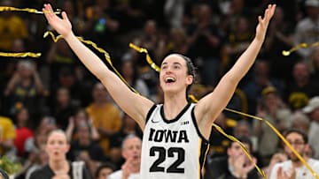 Mar 3, 2024; Iowa City, Iowa, USA; Iowa Hawkeyes guard Caitlin Clark (22) reacts during senior day after the game against the Ohio State Buckeyes. Clark broke the NCAA basketball all-time scoring record during the second quarter. Mandatory Credit: Jeffrey Becker-Imagn Images